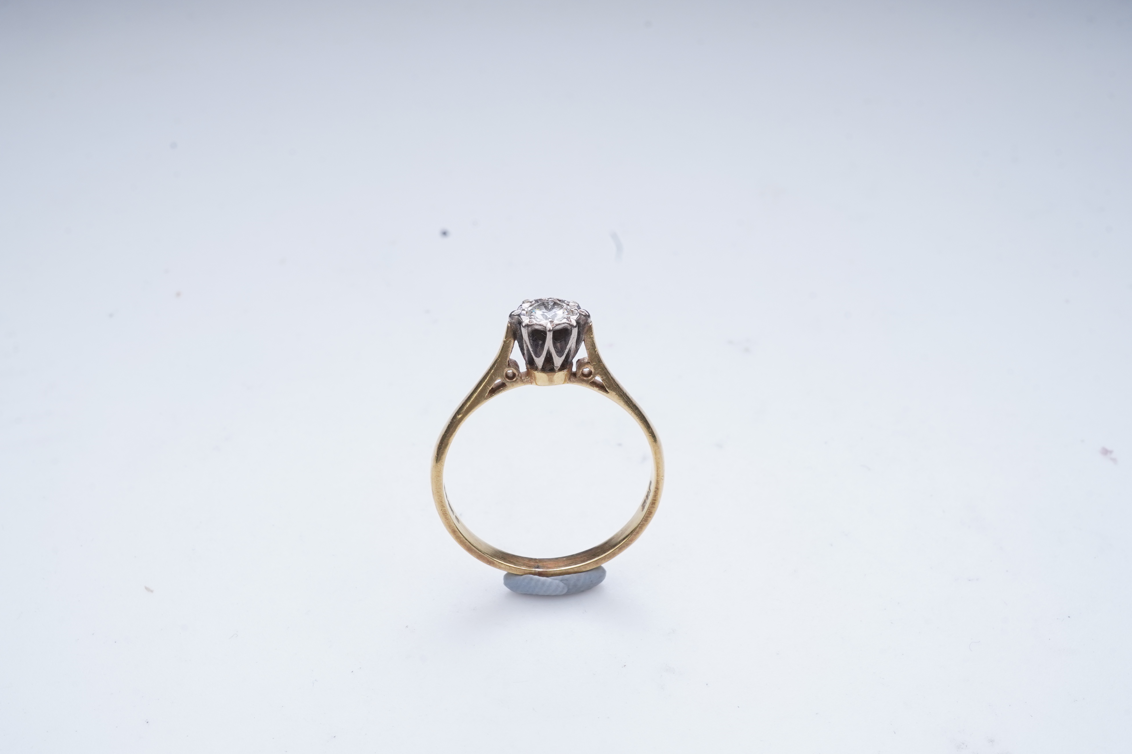 A diamond solitaire ring